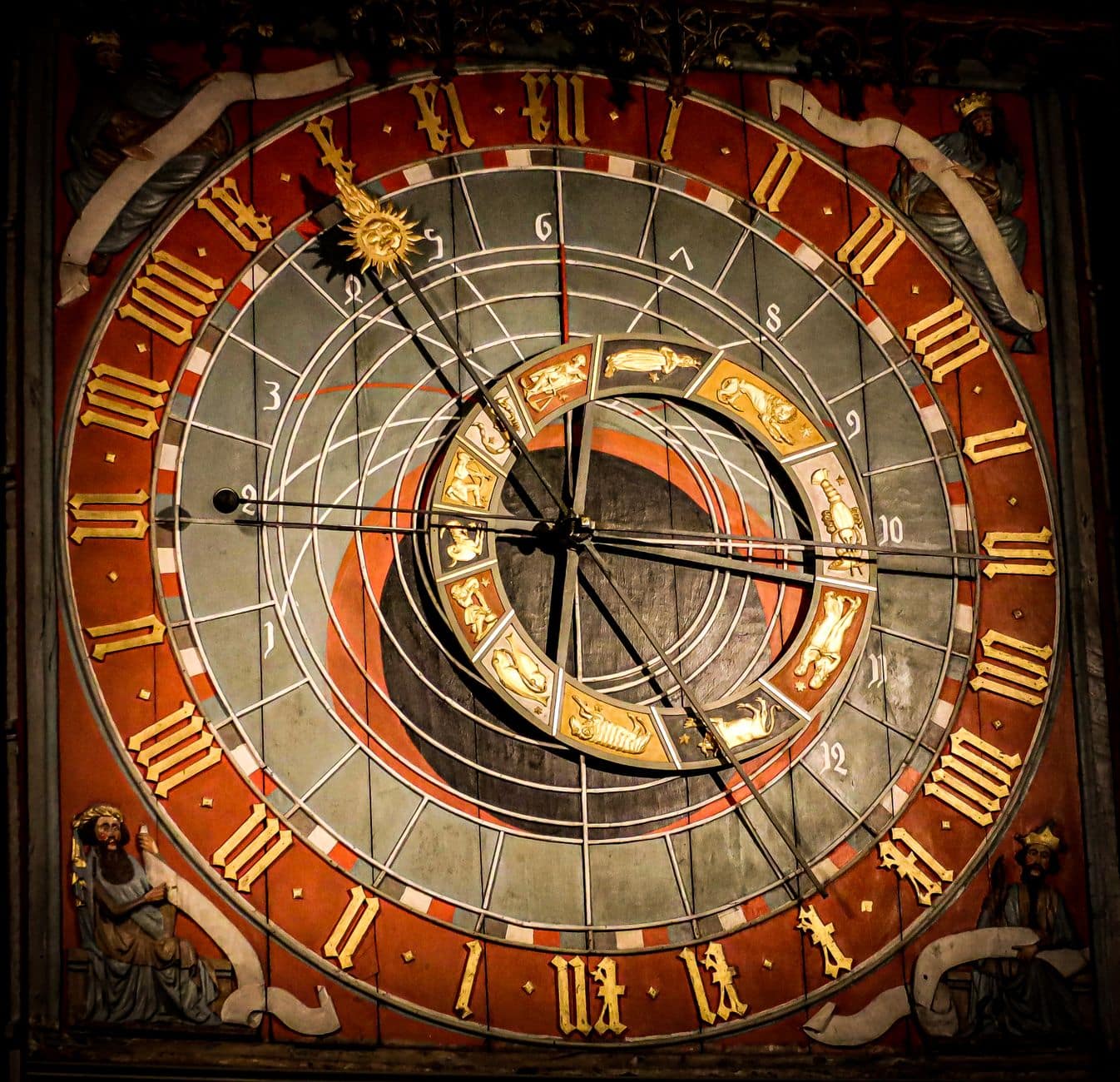 brown and red analog clock