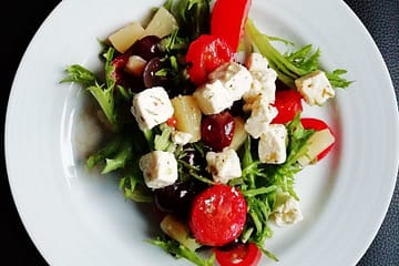 vegetable salad on white ceramic plate